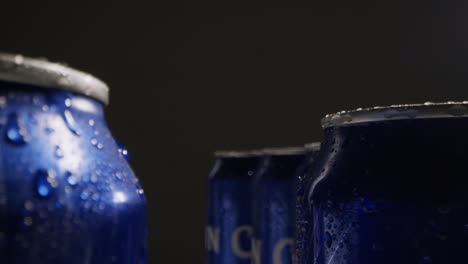 Close-Up-Or-Macro-Shot-Of-Condensation-Droplets-On-Takeaway-Cans-Of-Cold-Beer-Or-Soft-Drinks-Against-Black-Background-2